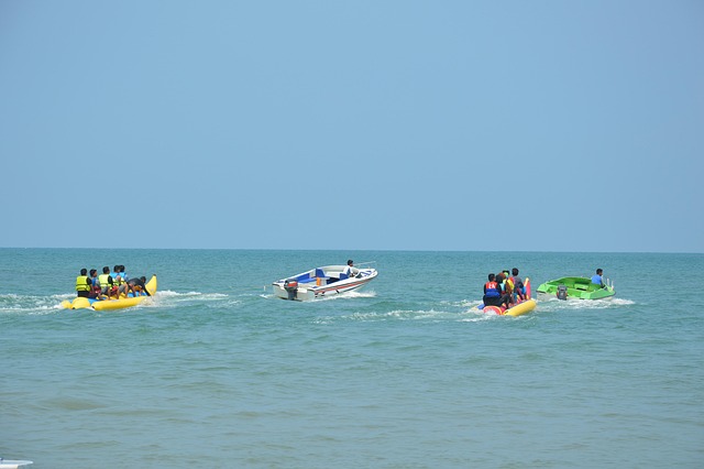 banana boat, sea, boat, beach, water, ocean, banana, holiday, fun, travel, summer, tourism, sport, enjoy, ride, people, sky, play, joy, speed, tropical, attraction, outdoors, swim, nature, indonesia